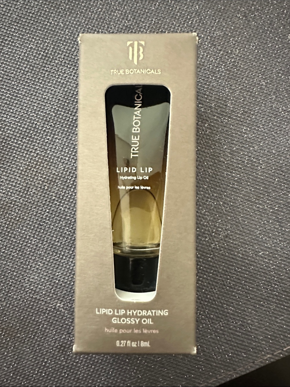 True Botanicals Lipid Lip Hydrating Glossy Oil — Clear/Gold